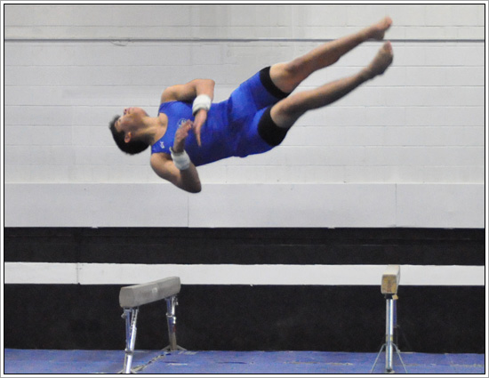 boy gymnastic moves floor